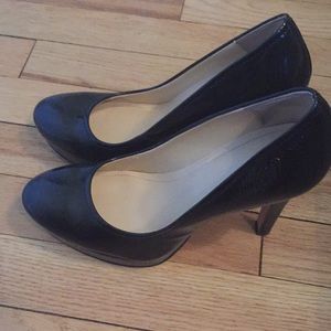 Shiny black Calvin Klein platform pumps!